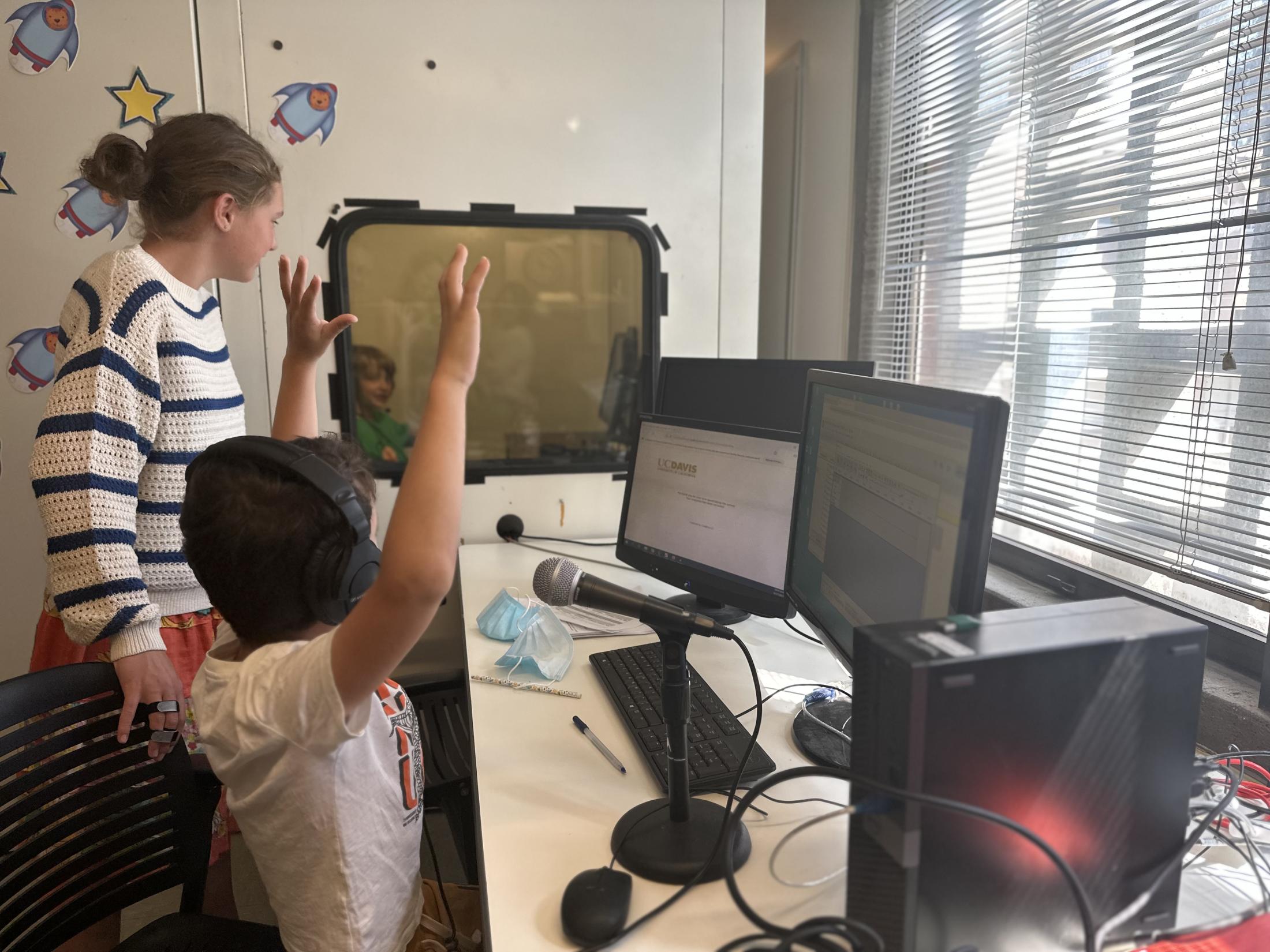 Children playing with the soundbooth